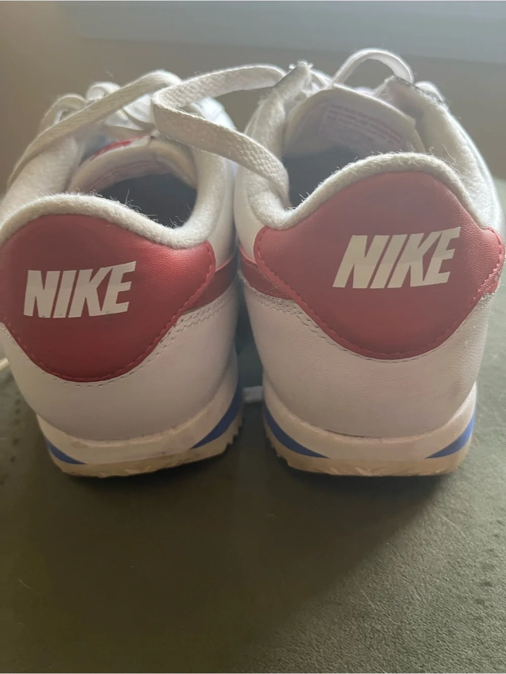 Nike Women's 8.5 White Leather Sneakers with Red Swoosh